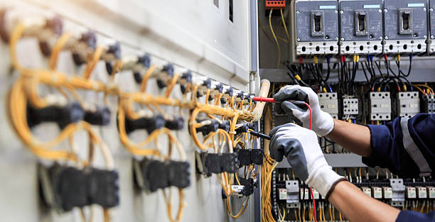Professional Electrician technician working in Highland Park, MI